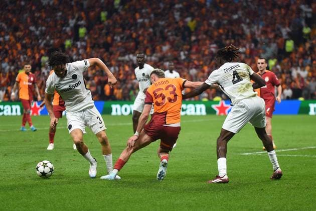 Baris Alper Yilmaz of Galatasaray and Jaouen Hadjam (3) , Tanguy Zoukrou (4) of Young Boys during the UEFA Champions League Play-Offs Second Leg match between Galatasaray and Young Boys at Rams Park Stadium in Istanbul , Turkey on August 27 , 2024. ( Photo by Seskimphoto ) Galatasaray v Young Boys - UEFA Champions League Play-Offs Second Leg 