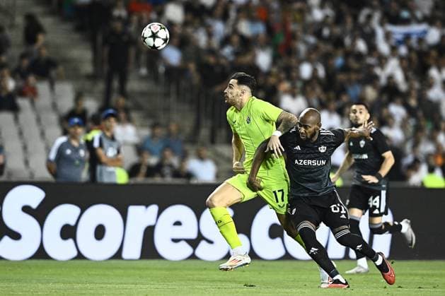 Qarabag v GNK Dinamo Zagreb - UEFA Champions Qualifying Play-Off: Second Leg BAKU, AZERBAIJAN - AUGUST 28: Sandro Kulenovic of Dinamo Zagreb in action against Kevin Medina of Qarabag during the UEFA Champions Qualifying Play-Off Second Leg match between Qarabag and GNK Dinamo Zagreb at Tofiq Bahramov Stadium on August 28, 2024 in Baku, Azerbaijan.  MarkoxLukunic PIXSELL