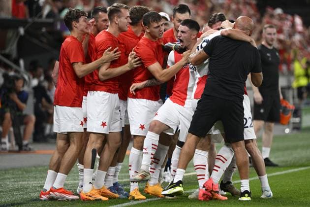 Christos Zafeiris (Slavia; middle) celebrates opening goal with teammates during the UEFA Champions League, 4th qualifying round, return match SK Slavia Praha (Czechia) vs Lille OSC (France), in Prague, Czech Republic, on August 28, 2024. (CTKxPhoto MichalxKamaryt) CTKPhotoP2024082807832  CTKPhotoP2024082807832