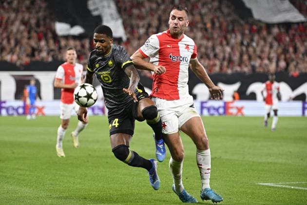 L-R Alexsandro (Lille) and Tomas Chory (Slavia) in action during the UEFA Champions League, 4th qualifying round, return match SK Slavia Praha (Czechia) vs Lille OSC (France), in Prague, Czech Republic, on August 28, 2024. (CTKxPhoto MichalxKamaryt) CTKPhotoP2024082807833  CTKPhotoP2024082807833