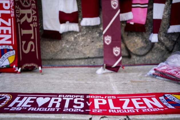 A merchandise seller is seen selling Hearts v Plzen scarves outside Tynecastle Stadium Heart of Midlothian v Viktoria Plzen, UEFA Europa League, Play-Off, Second Leg, Football, Tynecastle Park, Edinburgh, Scotland, UK, 29 Aug 2024 EDITORIAL USE ONLY No use with unauthorised audio, video, data, fixture lists, club league logos or live services. Online in-match use limited to 120 images, no video emulation. No use in betting, games or single club league player publications. Copyright: xPetexSummers Shutterstockx 14676189a