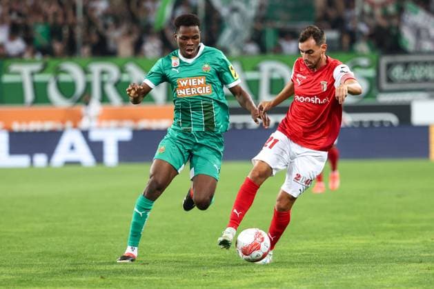 SOCCER - UEFA EL, Rapid vs Braga VIENNA,AUSTRIA,29.AUG.24 - SOCCER - UEFA Europa League, qualification, SK Rapid Wien vs Sporting Club de Braga. Image shows Mamadou Sangare (Rapid) and Ricardo Horta (Braga).  GEPAxpictures xArminxRauthner