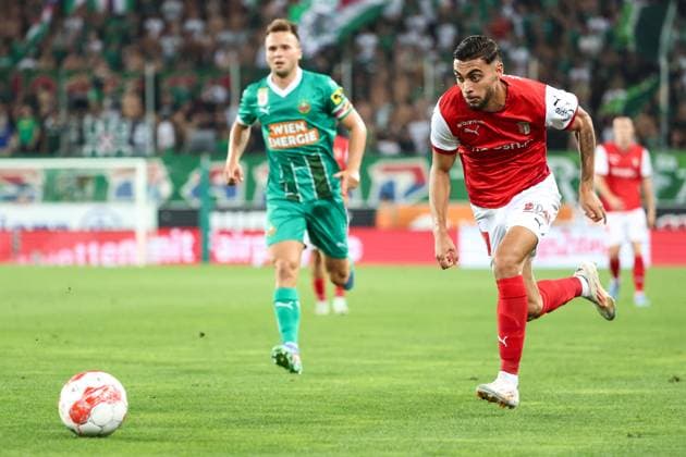 SOCCER - UEFA EL, Rapid vs Braga VIENNA,AUSTRIA,29.AUG.24 - SOCCER - UEFA Europa League, qualification, SK Rapid Wien vs Sporting Club de Braga. Image shows Matthias Seidl (Rapid) and Gabri Martinez (Braga).  GEPAxpictures xArminxRauthner