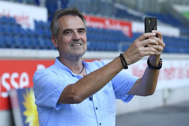 Soccer Regionalliga Staffel West Official photo session MSV Duisburg on 28 08 2023 in the Schauinsland Reisen Arena in Duisburg Christian Stiefelhagen Chairman of the Board Duisburg with cell phone Handy xRx