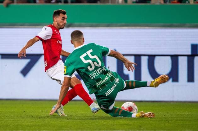 SOCCER - UEFA EL, Rapid vs Braga VIENNA,AUSTRIA,29.AUG.24 - SOCCER - UEFA Europa League, qualification, SK Rapid Wien vs Sporting Club de Braga. Image shows Ricardo Horta (Braga) and Nenad Cvetkovic (Rapid).  GEPAxpictures xPhilippxBrem