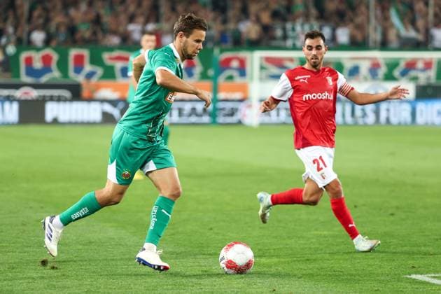 SOCCER - UEFA EL, Rapid vs Braga VIENNA,AUSTRIA,29.AUG.24 - SOCCER - UEFA Europa League, qualification, SK Rapid Wien vs Sporting Club de Braga. Image shows Louis Schaub (Rapid) and Ricardo Horta (Braga).  GEPAxpictures xArminxRauthner