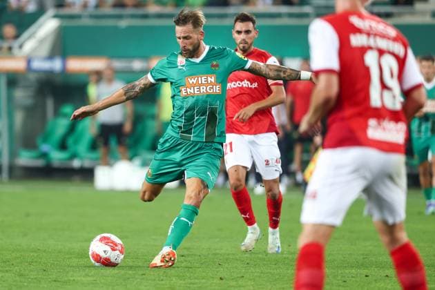 SOCCER - UEFA EL, Rapid vs Braga VIENNA,AUSTRIA,29.AUG.24 - SOCCER - UEFA Europa League, qualification, SK Rapid Wien vs Sporting Club de Braga. Image shows Guido Burgstaller (Rapid) and Ricardo Horta (Braga).  GEPAxpictures xArminxRauthner