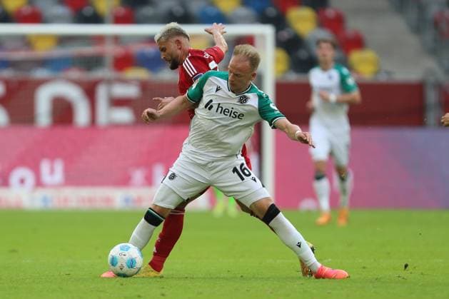 Nicolas Gavory Fortuna Duesseldorf and Havard Nielsen Hannover 96 in a duel during the 2 Bundesliga match between Fortuna Duesseldorf and Hannover 96 at Merkur Spiel Arena on August 30, 2024 in Düsseldorf, Germany Photo by Oliver Kaelke DeFodi Images Nicolas Gavory Fortuna Duesseldorf and Havard Nielsen Hannover 96 battle for the ball during the 2 Bundesliga match between Fortuna Duesseldorf and Hannover 96 at Merkur Spiel Arena on August 30, 2024 in Düsseldorf, Germany Photo by Oliver Kaelke DeFodi Images DFB DFL REGULATIONS PROHIBIT ANY USE OF PHOTOGRAPHS AS IMAGE SEQUENCES AND OR QUASI VIDEO Photo by Oliver Kaelke DeFodi Images Defodi 678 2024 08 30 OK DUSH96 0905 Defodi-678 DFB DFL REGULATIONS PROHIBIT ANY USE OF PHOTOGRAPHS AS IMAGE SEQUENCES AND OR QUASI-VIDEO.