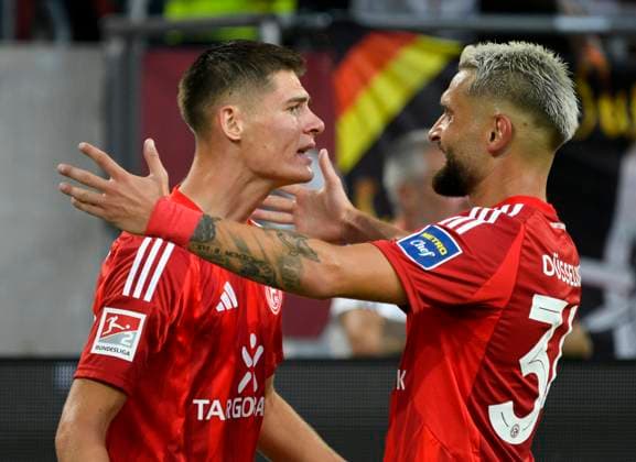 Merkur Spielarena Düsseldorf 30 8 2024, 2 Soccer Bundesliga Season 2024 25 4 Matchday, Fortuna Düsseldorf F95 vs Hannover 96 H96 Goalscorer Danny Schmidt F95 celebrates after his goal with Nikolas Gavory F95