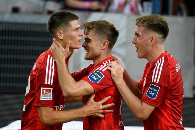 Merkur Spielarena Düsseldorf 30 8 2024, 2 Soccer Bundesliga Season 2024 25 4 Matchday, Fortuna Düsseldorf F95 vs Hannover 96 H96 Goalscorer Danny Schmidt F95 celebrates after his goal with Tim Rossmann F95, m and Isak Johannesson F95