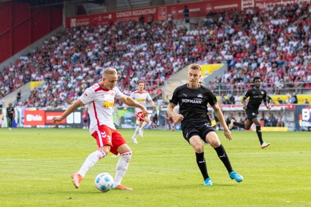 30 08 2024, Soccer, GER, Season, 2 Liga, Season 2024 2025, SSV Jahn Regensburg Spvgg Greuther Fürth Kai Pröger SSV Jahn Regensburg on the ball against Luca Itter DFL REGULATIONS PROHIBIT ANY USE OF PHOTOGRAPHS AS IMAGE SEQUENCES AND OR QUASI VIDEO Regensburg Bavaria Germany Jahnstadion Regensburg