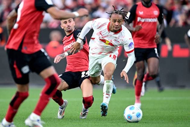 LEVERKUSEN - (l-r) Aleix Garcia of Bayer 04 Leverkusen, Xavi Simons of RB Leipzig during the Bundesliga match between Bayer 04 Leverkusen and RB Leipzig at Bay Arena on August 31, 2024 in Leverkusen, Germany. ANP Hollandse Hoogte Bundesliga 2024 25 xVIxANPxSportx xGerritxvanxKeulenxIVx 507238845 originalFilename: 507238845.jpg