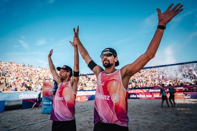 Beach volleyball men Allianz German Beach Tour German Beach Volleyball Championship 2024 31 08 2024 v l Nejc Zemljak and Jonathan Erdmann cheering after their victory Timmendorfer Strand Ahmann Hager Arena Schleswig Holstein Germany