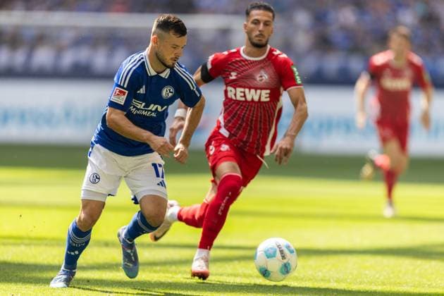 Soccer 2 Bundesliga 4 Matchday FC Schalke 04 1 FC Köln on 01 09 2024 at the Veltins Arena in Gelsenkirchen Adrian Gantenbein Schalke , left Leart Pacarada Köln , right DFL regulations prohibit any use of photographs as image sequences and or quasi video xJRx