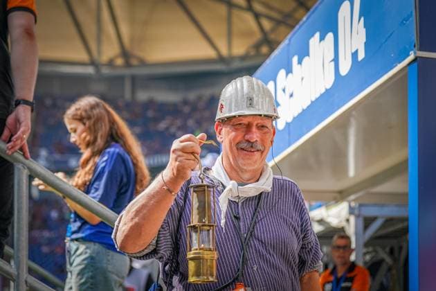 Soccer 2 Bundesliga season 2024 2025, matchday 4 FC Schalke 04 vs 1 FC Köln Veltins Arena, Gelsenkirchen Miner with miners lamp Copyright: xJOERANxSTEINSIEKx