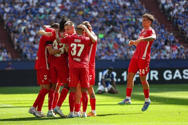 Gelsenkirchen, Germany, 01 09 24 Damion Downs 1 FC Koeln celebrates after scoring his team s first goal with teammates during the 2 Bundesliga match between FC Schalke 04 vs 1 FC Köln at Veltins Arena on September 01, 2024 in Gelsenkirchen, Germany Photo by Stefan Brauer Brauer Fotoagentur Gelsenkirchen, Germany, 01 09 24 Damion Downs 1 FC Koeln celebrates after scoring his team s first goal with teammates during the 2 Bundesliga match between FC Schalke 04 vs 1 FC Köln at Veltins Arena on September 1, 2024 in Gelsenkirchen, Germany Photo by Stefan Brauer Brauer Fotoagentur Gelsenkirchen Veltins Arena Germany Copyright: xStefanxBrauer Brauer-Fotoagenturx