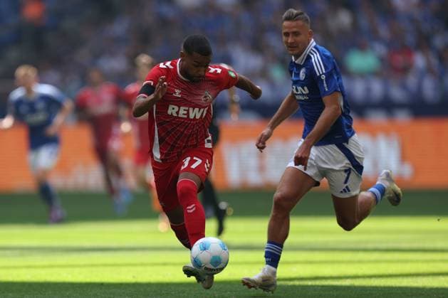Linton Maina 1 FC Köln and Paul Seguin FC Schalke 04 at the match of the 2 BL season 2024 25 FC Schalke 04 1 FC Köln Copyright Thomas Pakusch