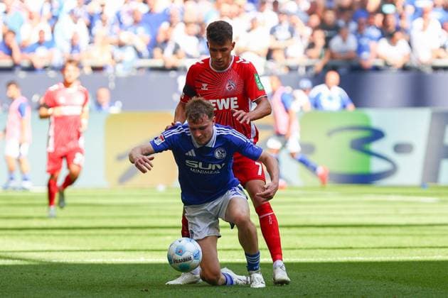 Ron Schallenberg FC Schalke 04 in duel, action, with Jan Thielmann 1 FC Koeln FC Schalke 04 vs 1 FC Koeln, Football, 2 Bundesliga, Matchday 4, Season 2024 2025, 01 09 2024 Photo kolbert press Ant Palmer Veltins Arena NRW Germany Copyright: xkolbert-press AntxPalmerx