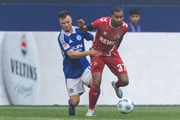 Soccer 2 Bundesliga 4 Matchday FC Schalke 04 1 FC Köln on 01 09 2024 at the Veltins Arena in Gelsenkirchen Adrian Gantenbein Schalke , left Linton Maina Köln , right DFL regulations prohibit any use of photographs as image sequences and or quasi video xJRx