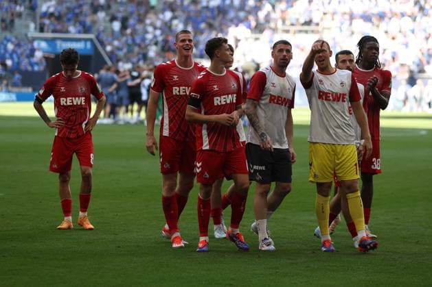 The players of 1 FC Köln together with the fans are happy about the 1 3 victory in the match of the 2 BL season 2024 25 FC Schalke 04 1 FC Köln Copyright Thomas Pakusch
