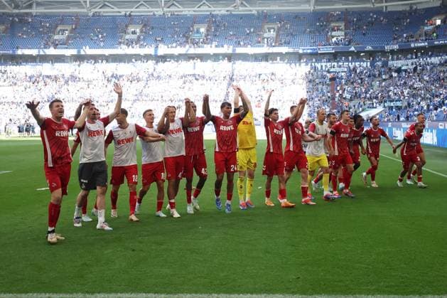 The players of 1 FC Köln together with the fans are happy about the 1 3 victory in the match of the 2 BL season 2024 25 FC Schalke 04 1 FC Köln Copyright Thomas Pakusch
