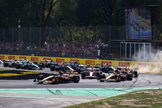 September 1, 2024, Monza, Italy: Lando Norris of McLaren, Oscar Piastri of McLaren, Charles Leclerc of Ferrari and the rest of the drivers drive on the track during the start of Italian Formula One Grand Prix at Autodromo Nazionale Monza circuit, in Monza on September 1st, 2024. Monza Italy - ZUMAz156 0758581658st Copyright: xBeataxZawrzelx