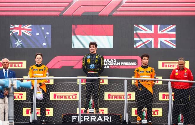 September 1, 2024, Monza, Italy: Charles Leclerc of Ferrari, Oscar Piastri of McLaren and Lando Norris of McLaren are seen on the podium after winning the Italian Formula One Grand Prix at Autodromo Nazionale Monza circuit, in Monza on September 1st, 2024. Monza Italy - ZUMAz156 0758597080st Copyright: xBeataxZawrzelx
