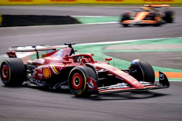 MONZA - Charles Leclerc (Ferrari) with Lando Norris (McLaren) in the background in action during the Italian Grand Prix on the Monza circuit. ANP SANDER KONING xVIxANPxSportx xxANPxIVx 507362328 originalFilename: 507362328.jpg