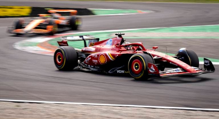 MONZA - Charles Leclerc (Ferrari) with Lando Norris (McLaren) in the background in action during the Italian Grand Prix on the Monza circuit. ANP SANDER KONING xVIxANPxSportx xxANPxIVx 507362692 originalFilename: 507362692.jpg