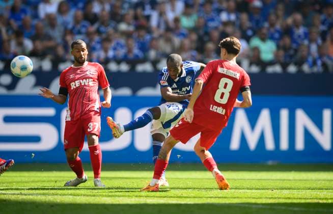 v l Linton MAINA K , Christopher ANTWI ADJEI GE , Denis HUSEINBASIC K duel, Action, Soccer 2 Bundesliga, Matchday 4, FC Schalke 04 GE 1 FC Koeln K 1 3, on 01 09 2024 in Gelsenkirchen Germany DFL regulations prohibit any use of photographs as image sequences and or quasi video Â