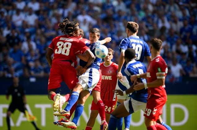 v l Elias BAKATUKANDA K , Ron SCHALLENBERG GE , Eric MARTEL K , Kenan KARAMAN GE , Moussa SYLLA aerial combat, duel, action, Football 2 Bundesliga, Matchday 4, FC Schalke 04 GE 1 FC Koeln K 1 3, on 01 09 2024 in Gelsenkirchen Germany DFL regulations prohibit any use of photographs as image sequences and or quasi video Â