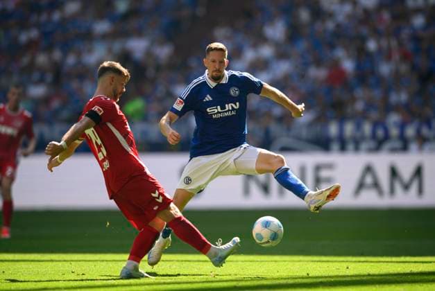 v l Jan THIELMANN K , Janik BACHMANN GE duel, action, Soccer 2 Bundesliga, Matchday 4, FC Schalke 04 GE 1 FC Koeln K 1 3, on 01 09 2024 in Gelsenkirchen Germany DFL regulations prohibit any use of photographs as image sequences and or quasi video Â