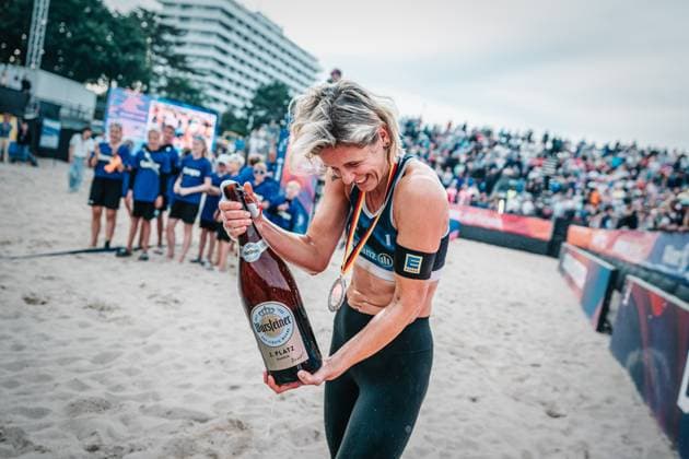 Beach volleyball women and men Allianz German Beach Tour German Beach Volleyball Championship 2024 01 09 2024 Laura Ludwig at the award ceremony Timmendorfer Strand Ahmann Hager Arena Schleswig Holstein Germany