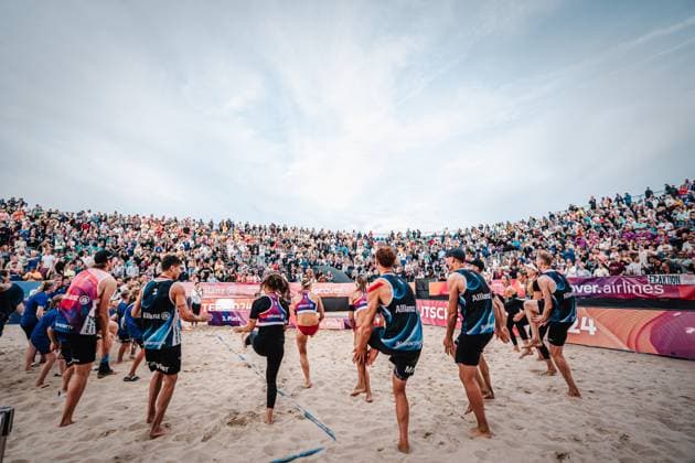 Beach volleyball women and men Allianz German Beach Tour German Beach Volleyball Championship 2024 01 09 2024 The winners celebrate with the fans Timmendorfer Strand Ahmann Hager Arena Schleswig Holstein Germany