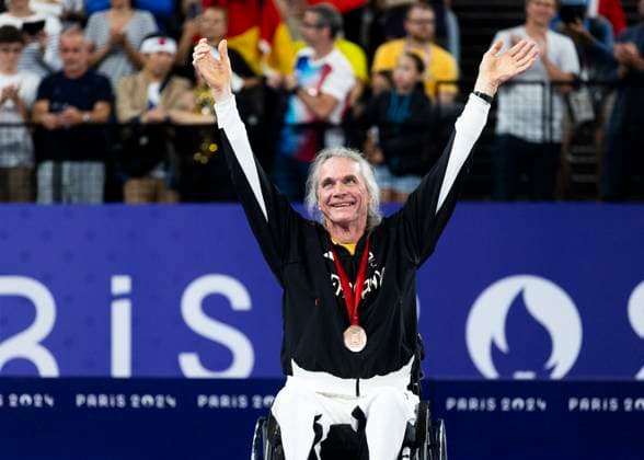 PARIS, FRANCE SEPTEMBER 02 Thomas WANDSCHNEIDER GER , startclass WH1 wins the bronze medal and celebrates during the winning ceremony Paris 2024 Summer Paralympic Games at Porte de la Chapelle Arena on September 02, 2024 in Paris, France Photo by Mika Volkmann DBS 202408027-20240908