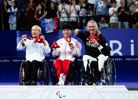PARIS, FRANCE SEPTEMBER 02 Thomas WANDSCHNEIDER GER , startclass WH1 wins the bronze medal and celebrates during the winning ceremony Paris 2024 Summer Paralympic Games at Porte de la Chapelle Arena on September 02, 2024 in Paris, France Photo by Mika Volkmann DBS 202408027-20240908