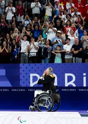PARIS, FRANCE SEPTEMBER 02 Thomas WANDSCHNEIDER GER , startclass WH1 wins the bronze medal and celebrates during the winning ceremony Paris 2024 Summer Paralympic Games at Porte de la Chapelle Arena on September 02, 2024 in Paris, France Photo by Mika Volkmann DBS 202408027-20240908