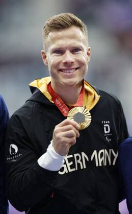 Paris Paralympics: Athletics Germany s Markus Rehm poses with his men s T64 long jump gold medal at the Paris Paralympics on Sept. 5, 2024, at Stade de France in Saint-Denis, near Paris.  A14AA0003394753P