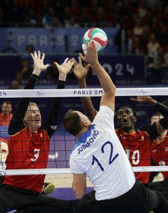 Paris , Paralympics , Sitting volleyball , Germany vs Bosnia and Herzegovina , from left Thomas Renger Francis Tonleu GER
