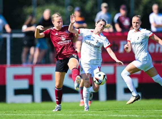 Eileen Campbell SC Freiburg and Amelie Thoele 1 FC Nuernberg in a duel, Frauen Bundesliga, 1 FC Nuernberg vs SC Freiburg, Sportpark Valznerweiher on September 07, 2024 in Nuremberg, Germany Photo by Silas Schueller DeFodi Images Eileen Campbell SC Freiburg and Amelie Thoele 1 FC Nuernberg battle for the ball, Frauen Bundesliga, 1 FC Nuernberg vs SC Freiburg, Sportpark Valznerweiher on September 7, 2024 in Nuremberg, Germany Photo by Silas Schueller DeFodi Images Defodi 121 121 FCNSCF 20240907 189 Defodi-121