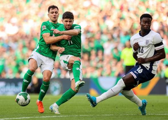 UEFA Nations League Group B2, Aviva Stadium, Dublin 7 9 2024 Republic of Ireland vs England Ireland s Jayson Molumby and Robbie Brady with Marc GuÃ Jayson Molumby and Robbie Brady with Marc GuÃ hi 7 9 2024  Copyright: x INPHO RyanxByrnex RB1_0568