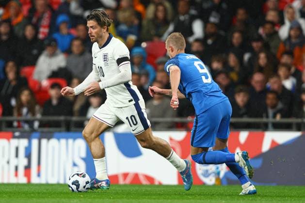 Jack Grealish of England under pressure from Fredrik Jensen of Finland England v Finland, UEFA Nations League, League B, Group 2, Football, Wembley Stadium, London, UK, 10 Sep 2024 EDITORIAL USE ONLY No use with unauthorised audio, video, data, fixture lists, club league logos or live services. Online in-match use limited to 120 images, no video emulation. No use in betting, games or single club league player publications.  Copyright: xKieranxMcManus Shutterstockx 14706825aq