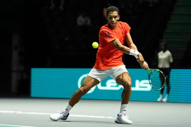 10th September 2024; AO Arena, Manchester, England; Davis Cup Finals, Group Stage, Group D Day 1; Felix Auger-Aliassime of Canada plays a backhand shot  ActionPlus12691287 StevenxFlynn