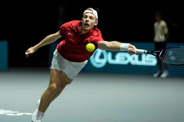 12th September 2024; AO Arena, Manchester, England; Davis Cup Finals, Group Stage, Group D Day 3; Denis Shapovalov of Canada stretches to play a forehand shot during the second set  ActionPlus12691599 StevenxFlynn