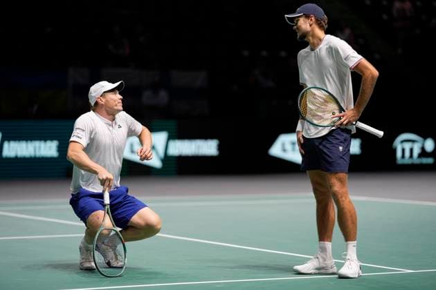 12th September 2024; AO Arena, Manchester, England; Davis Cup Finals, Group Stage, Group D Day 3; Otto Virtanen of Finland jokes with Harri Heli& xf6;vaara of Finland after taking a tumble during the doubles match against Canada  ActionPlus12691670 StevenxFlynn