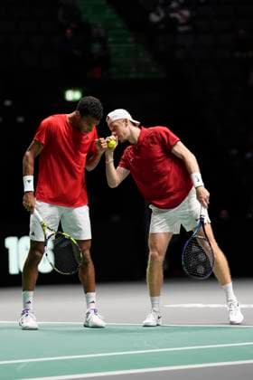 12th September 2024; AO Arena, Manchester, England; Davis Cup Finals, Group Stage, Group D Day 3; Felix Auger-Aliassime of Canada and Denis Shapovalov of Canada fist pump between points during their doubles match  ActionPlus12691659 StevenxFlynn