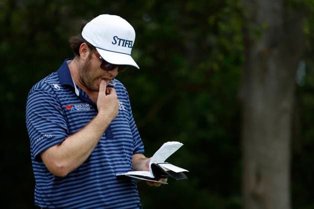 FRANKLIN, TN - SEPTEMBER 12: Harry Higgs looks at his yardage book during the first round of the Simmons Bank Open, September 12, 2024, at Vanderbilt Legends Club in Franklin, Tennessee. (Photo by Matthew Maxey Icon Sportswire) GOLF: SEP 12 Korn Ferry Tour - Simmons Bank Open EDITORIAL USE ONLY Icon240912048