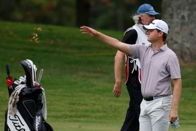 FRANKLIN, TN - SEPTEMBER 12: Austin Hitt tosses leaves to test the wind during the first round of the Simmons Bank Open, September 12, 2024, at Vanderbilt Legends Club in Franklin, Tennessee. (Photo by Matthew Maxey Icon Sportswire) GOLF: SEP 12 Korn Ferry Tour - Simmons Bank Open EDITORIAL USE ONLY Icon240912065