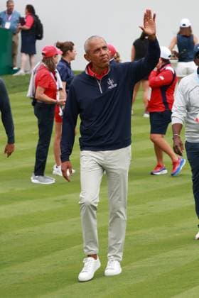 GAINESVILLE, VA - SEPTEMBER 13: Former United States president Barack Obama waves to the fans at the first tee during the Friday Four Ball of the first round of the 2024 Solheim Cup on September 13, 2024, at Robert Trent Jones Golf Club at Gainesville, Virginia. (Photo by Brian Spurlock Icon Sportswire) GOLF: SEP 13 Solheim Cup EDITORIAL USE ONLY Icon24091324