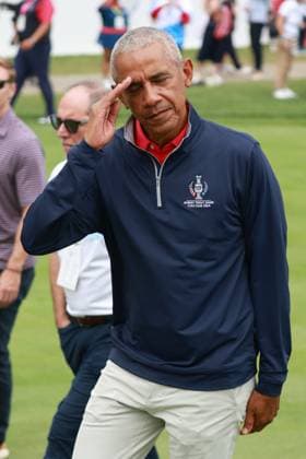GAINESVILLE, VA - SEPTEMBER 13: Former United States president Barack Obama salutes at the first tee during the Friday Four Ball of the first round of the 2024 Solheim Cup on September 13, 2024, at Robert Trent Jones Golf Club at Gainesville, Virginia. (Photo by Brian Spurlock Icon Sportswire) GOLF: SEP 13 Solheim Cup EDITORIAL USE ONLY Icon24091326